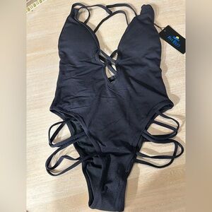 NEW WITH TAGS SMALL BLACK ONE PIECE SUIT. REE BEES SWIMWEAR.